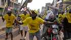 Supporters of Uganda's Yoweri Musseveni celebrate as secures seventh term in office