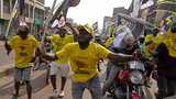 Supporters of Uganda's Yoweri Musseveni celebrate as secures seventh term in office